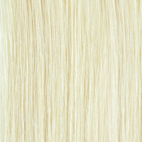 Long, beautiful 20 inch tape hair extensions in natural color