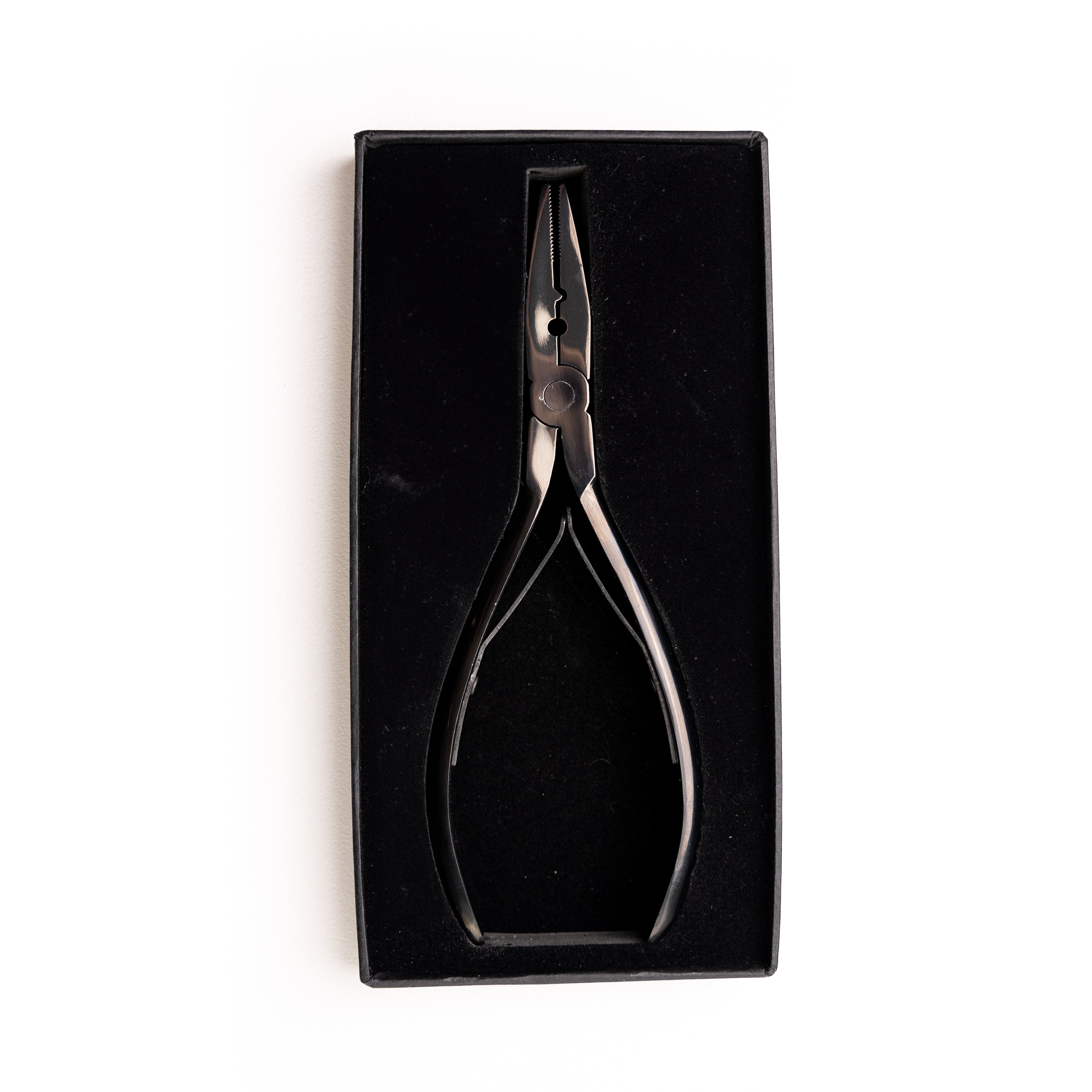 Pliers with rubber grip handle and serrated jaws for better grip