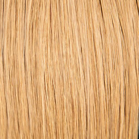 Close-up image of Tape 20 Inch Hair Extensions in natural black color, seamless and silky smooth for adding length and volume to hair