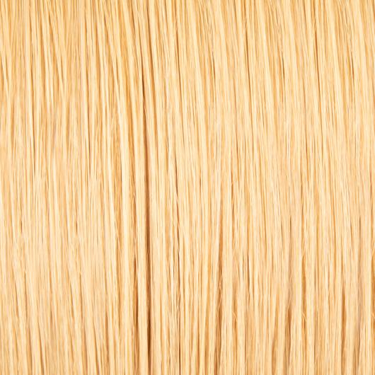 High-quality tape 20 inch hair extensions in a natural shade