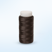  Nylon thread on a sewing machine, ready to be used for stitching