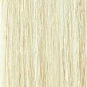 Long, straight 20 inch tape-in hair extensions in a natural shade